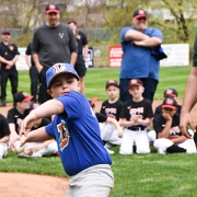 Daniel Papoosha, throwing out the first pitch for the Coach Pitch teams