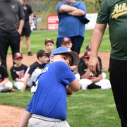 Daniel Papoosha, throwing out the first pitch for the Coach Pitch teams