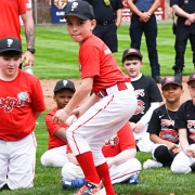 Stephen Rimkus, throwing out the first pitch for the Minors teams