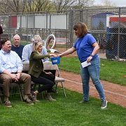 State Representative Joan Hartley drawing the winning ticket for the 50/50 raffle.